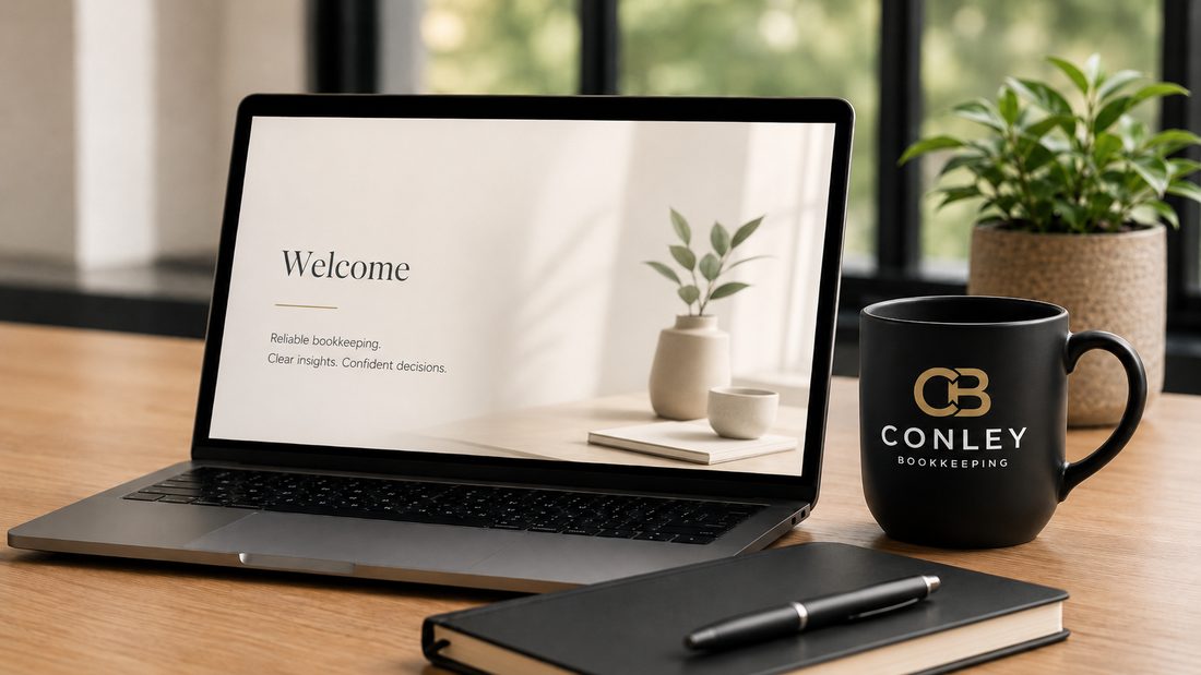 Laptop on a desk showing the Conley Bookkeeping welcome screen, next to a branded Conley Bookkeeping mug